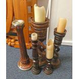 5 DECORATIVE HARDWOOD CANDLESTICKS OF VARYING SIZE