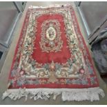 CHINESE CARPET WITH PINK & CREAM FLORAL PATTERN.