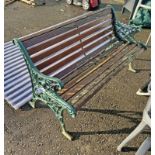WOODEN GARDEN BENCH WITH PAINTED CAST METAL ENDS