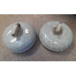 PAIR OF CURLING STONES WITH WOOD AND METAL HANDLES Condition Report: Both have some