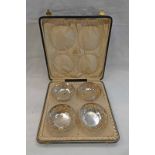 CASED SET OF 4 SILVER CIRCULAR DISHES WITH PIERCED DECORATION, BIRMINGHAM 1921 RETAILED BY P.
