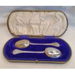 CASED PAIR OF SILVER JAMES II PATTERN SERVING SPOONS BY JOHN ROUND & SONS,