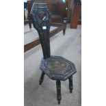 EARLY 20TH CENTURY EBONISED SPINNING CHAIR WITH CARVED DECORATION ON TURNED SUPPORTS STAMPED L S