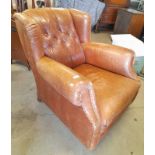 TAN LEATHER BUTTON WINGBACK ARMCHAIR ON TURNED SUPPORTS
