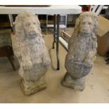 PAIR OF RECONSTITUTED STONE LIONS,