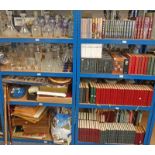 8 SHELVES OF GLASSWARE, EDINBURGH CRYSTAL, WALL CLOCK, FRAMED PICTURES, BOOKS, CD'S,