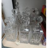 9 CUT GLASS CRYSTAL DECANTERS ON PART SHELF