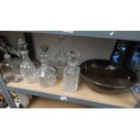 7 CUT GLASS DECANTERS,