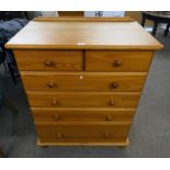 PINE CHEST OF 2 SHORT OVER 4 LONG DRAWERS ON BUN FEET.