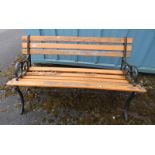 WOODEN GARDEN BENCH WITH PAINTED CAST METAL ENDS,