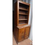 20TH CENTURY MAHOGANY BOOKCASE WITH ADJUSTABLE SHELVES OVER BASE WITH 2 PANEL DOORS,