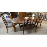 MAHOGANY EXTENDING DINING TABLE WITH 2 LEAVES ON QUEEN ANNE SUPPORTS WITH SET OF 6 DINING CHAIRS ON