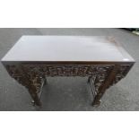 EASTERN HARDWOOD ALTAR TABLE WITH CARVED ORIENTAL DECORATION Condition Report: Top