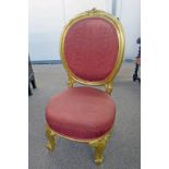19TH CENTURY GILT CHAIR WITH OVAL PANEL BACK ON SHAPED SUPPORTS