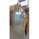 DECORATIVE CARVED GILT WOOD FRAMED MIRROR.