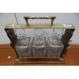MODERN MAHOGANY & BRASS CASED 3 DECANTER TANTALUS Condition Report: The tantalus is