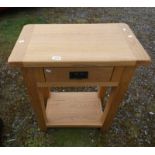 OAK LAMP TABLE WITH SINGLE DRAWER ON SQUARE SUPPORTS.