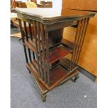 MAHOGANY REVOLVING BOOKCASE WITH SHAPED TOP ON CABRIOLE SUPPORTS