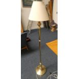 BRASS STANDARD LAMP ON CIRCULAR BASE WITH PAW FEET