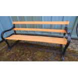 WOODEN GARDEN BENCH WITH PAINTED CAST METAL ENDS