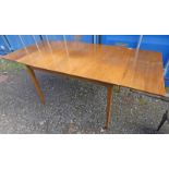 MID 20TH CENTURY WALNUT DRAW-LEAF TABLE.