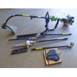 THE HANDY 4-IN-1 GARDEN PETROL STRIMMER/POLE TRIMMER WITH VARIOUS ATTACHMENTS