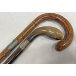 SILVER BANDED HORN HANDLED WALKING STICK AND A SILVER BANDED WALKING CANE -2-