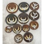 12 SETS OF EUROPEAN WILD BOAR TUSKS MOUNTED ON WOODEN CIRCULAR SHIELDS -12-