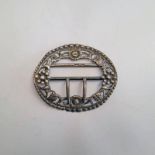 SILVER FLORAL DECORATED BUCKLE BY JULIUS ROSENTHAL,