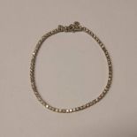 18CT GOLD DIAMOND SET LINE BRACELET THE BRILLIANT CUT DIAMOND APPROX 2.