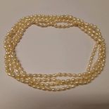LONG STRAND BAROQUE PEARL NECKLACE - 125CM LONG,