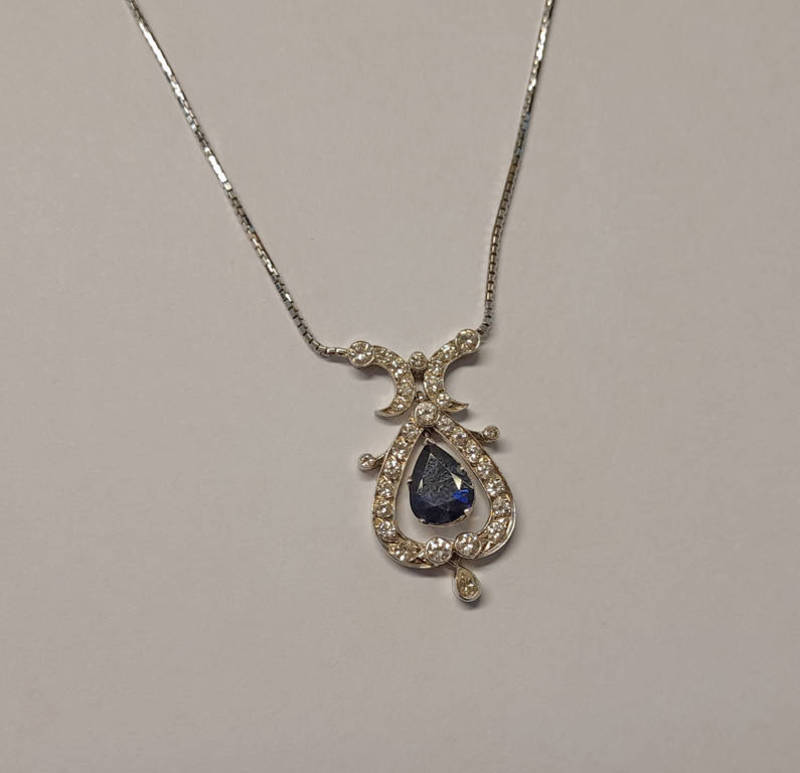 18K WHITE GOLD SAPPHIRE & DIAMOND PENDANT ON CHAIN.