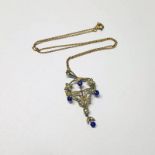 EARLY 20TH CENTURY GOLD AMETHYST & SEED PEARL PENDANT ON A FINE CHAIN - 5.