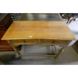 LATE 19TH CENTURY OAK SIDE TABLE WITH 2 DRAWERS ON TURNED SUPPORTS WITH UNDERSTRETCHERS,
