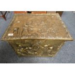 BRASS COAL BOX WITH EMBOSSED DECORATION OF CLASSICAL SCENE 42 CM TALL X 54 CM WIDE