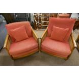 PAIR OF ERCOL OAK FRAMED ARMCHAIRS WITH BERGERE PANEL BACKS & SIDE