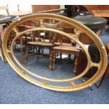 GILT FRAMED OVAL MIRROR,