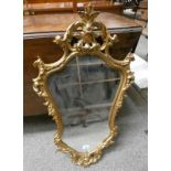 DECORATIVE GILT WALL MIRROR WITH SHAPED GLASS,