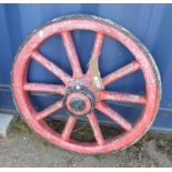 PAINTED RECONSTITUTED STONE CART WHEEL ORNAMENT.