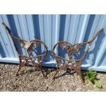 PAIR OF CAST IRON BENCH ENDS WITH GRAPE DECORATION