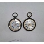 2 FOB WATCHES WITH SILVER AND GOLD DECORATED ENAMEL DIALS.