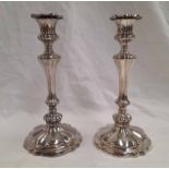 PAIR OF SILVER PLATED CANDLESTICKS.