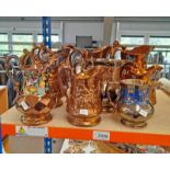 12 19TH & 20TH CENTURY LUSTRE JUGS ON PART SHELF