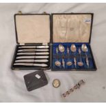 CASED CHINESE WHITE METAL TEASPOONS WITH DRAGON HANDLES,