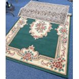 DUNELM MILL GREEN AND CREAM FLORAL RUG AND ONE OTHER RUG -2-