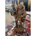 20TH CENTURY CARVED WOODEN FIGURE/TABLE LAMP OF AN ELDERLY MALE TRAVELLER WITH LANTERN & POLE AXE,