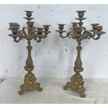PAIR OF 19TH/20TH CENTURY CAST GILT METAL CANDELABRAS ON LION PAW FEET,