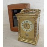 19TH CENTURY BRASS & GLAZED CARRIAGE CLOCK WITH 2 ENAMEL DIALS TO FRONT & BELL TO BASE WITH ITS