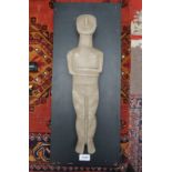 COMPOSIT ABSTRACT FIGURE OF A PERSON, MOUNTED TO WOODEN BACKGROUND. 61 CM X 25.
