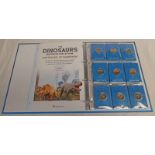 THE DINOSAURS DISCOVERY COLLECTION OF 38 X COLLECTOR EDITION MEDALS IN ALBUM